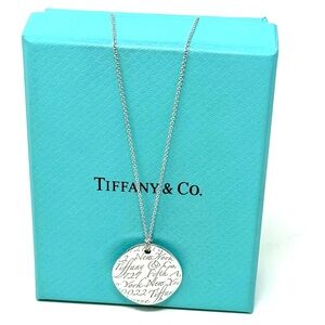 Authentic New York Notes Wavy Round Circle Pendant Necklace.